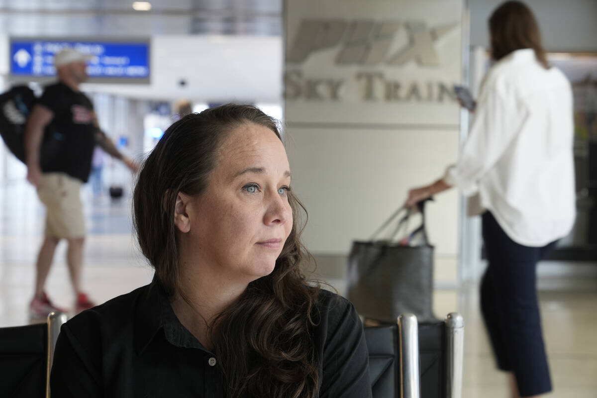 Lindsay Ruck, a server at Phoenix Sky Harbor International Airport restaurants, pauses in Termi ...