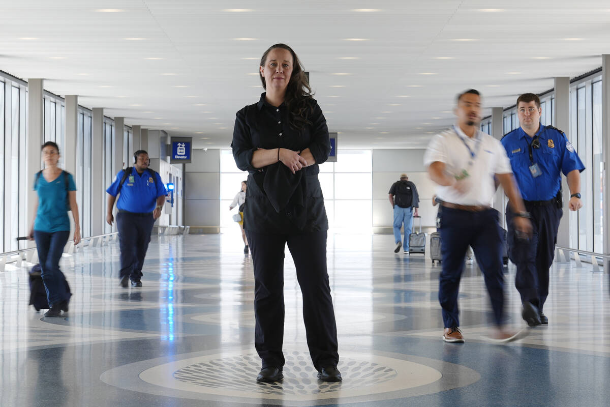 Lindsay Ruck, a server at Phoenix Sky Harbor International Airport restaurants, pauses in Termi ...