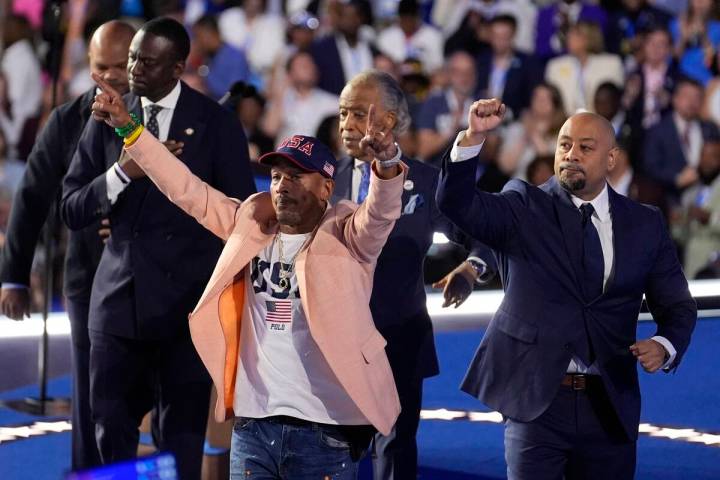 FILE - The Central Park Five join Reverend Al Sharpton during the Democratic National Conventio ...