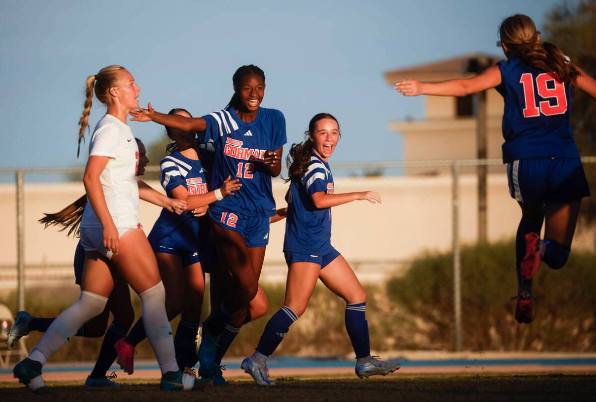 Bishop Gorman midfielder Amiya Warner (12) celebrates her goal against Coronado with teammates ...