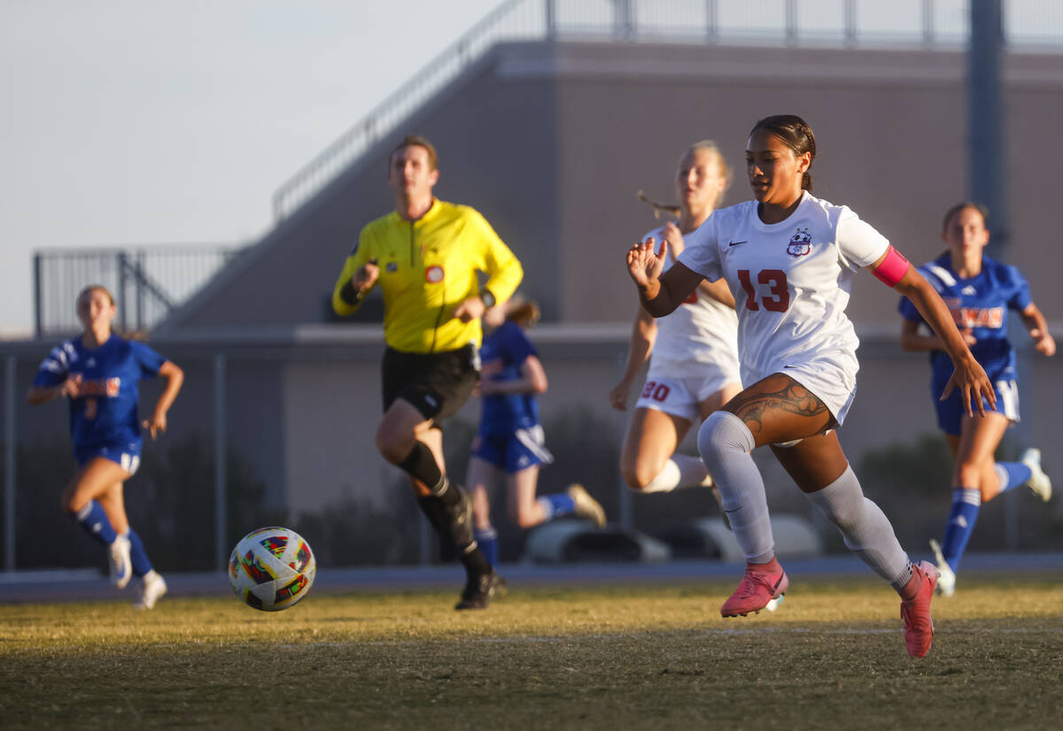 Coronado defender Tielua Baptista (13) runs with the ball during a soccer game at Bishop Gorman ...