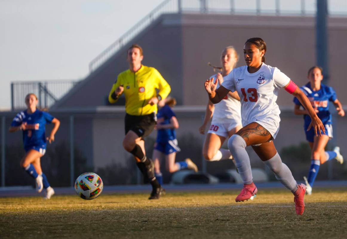 Coronado defender Tielua Baptista (13) runs with the ball during a soccer game at Bishop Gorman ...