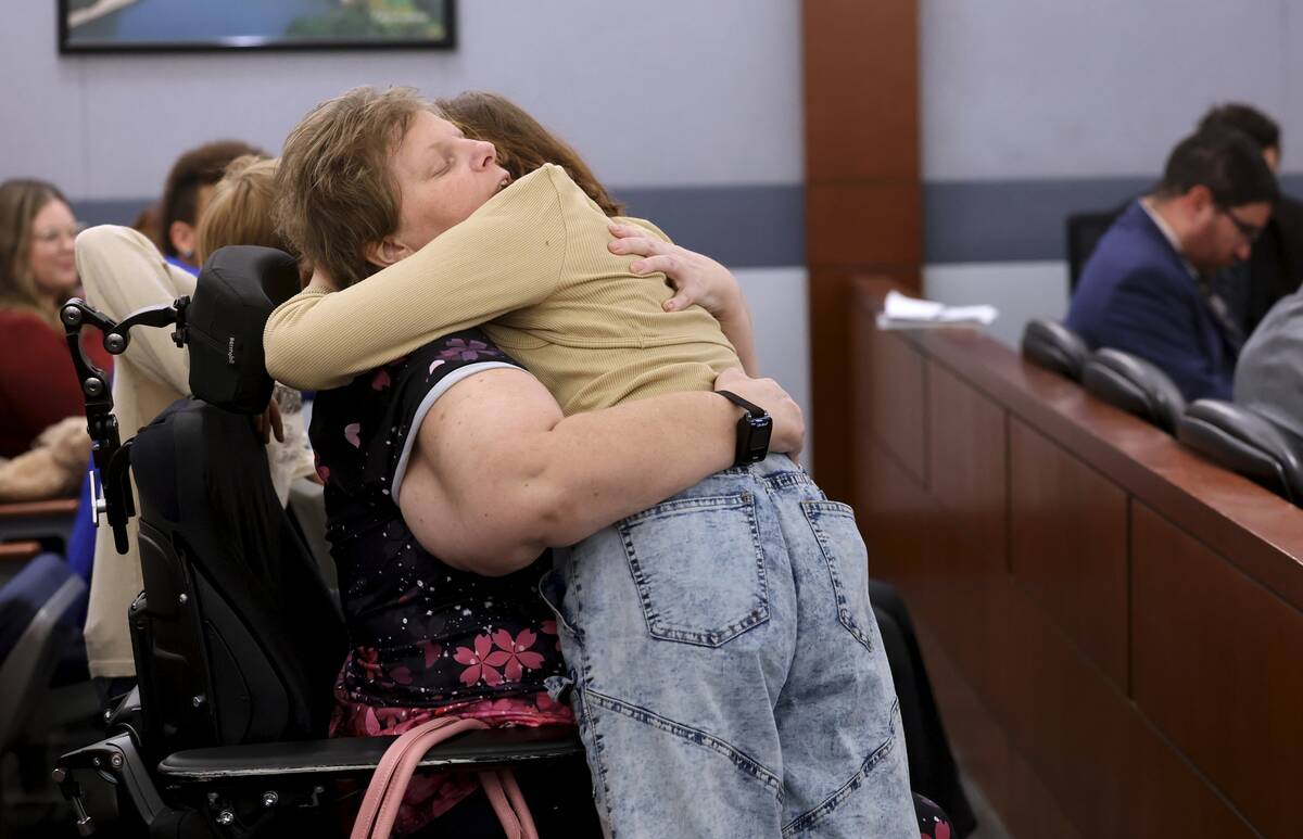 Amber Reedy hugs her daughter Isabella McPherson, 12, after Isabella gave a victim impact state ...