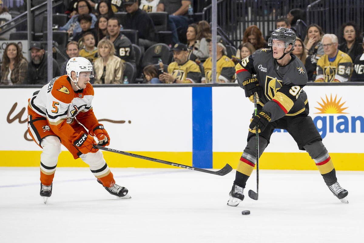 Golden Knights right wing Victor Olofsson (95) keeps the puck from Anaheim Ducks defenseman Urh ...