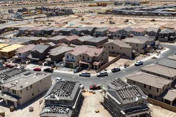 Construction is underway for a new housing development in the western portion of Summerlin near ...