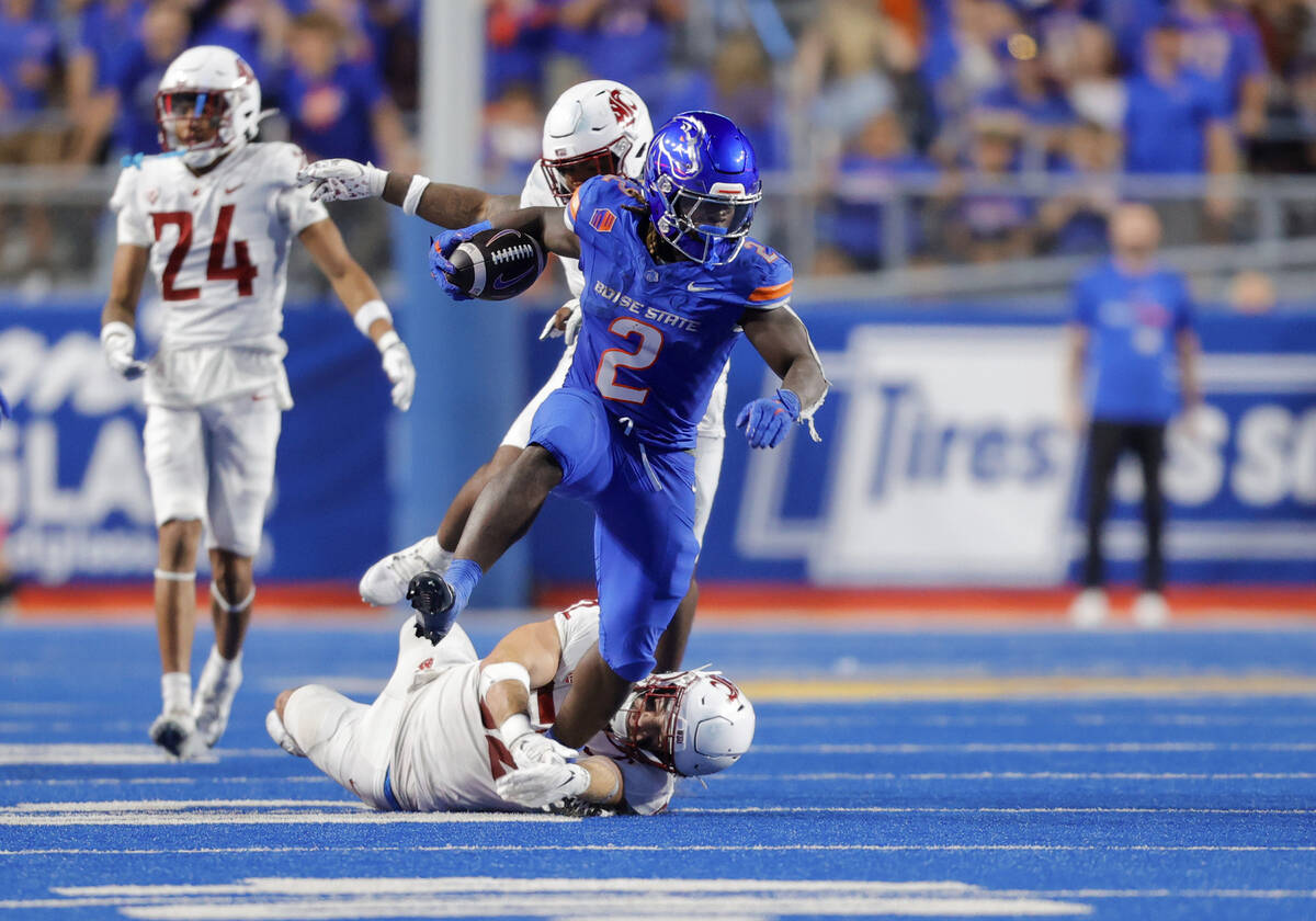 Boise State running back Ashton Jeanty (2) runs with the ball against Washington State in the s ...