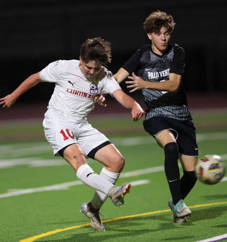 Coronado midfielder Aiden Sena (10) kicks the ball past Palo Verde defender Jaxon Law (2) durin ...