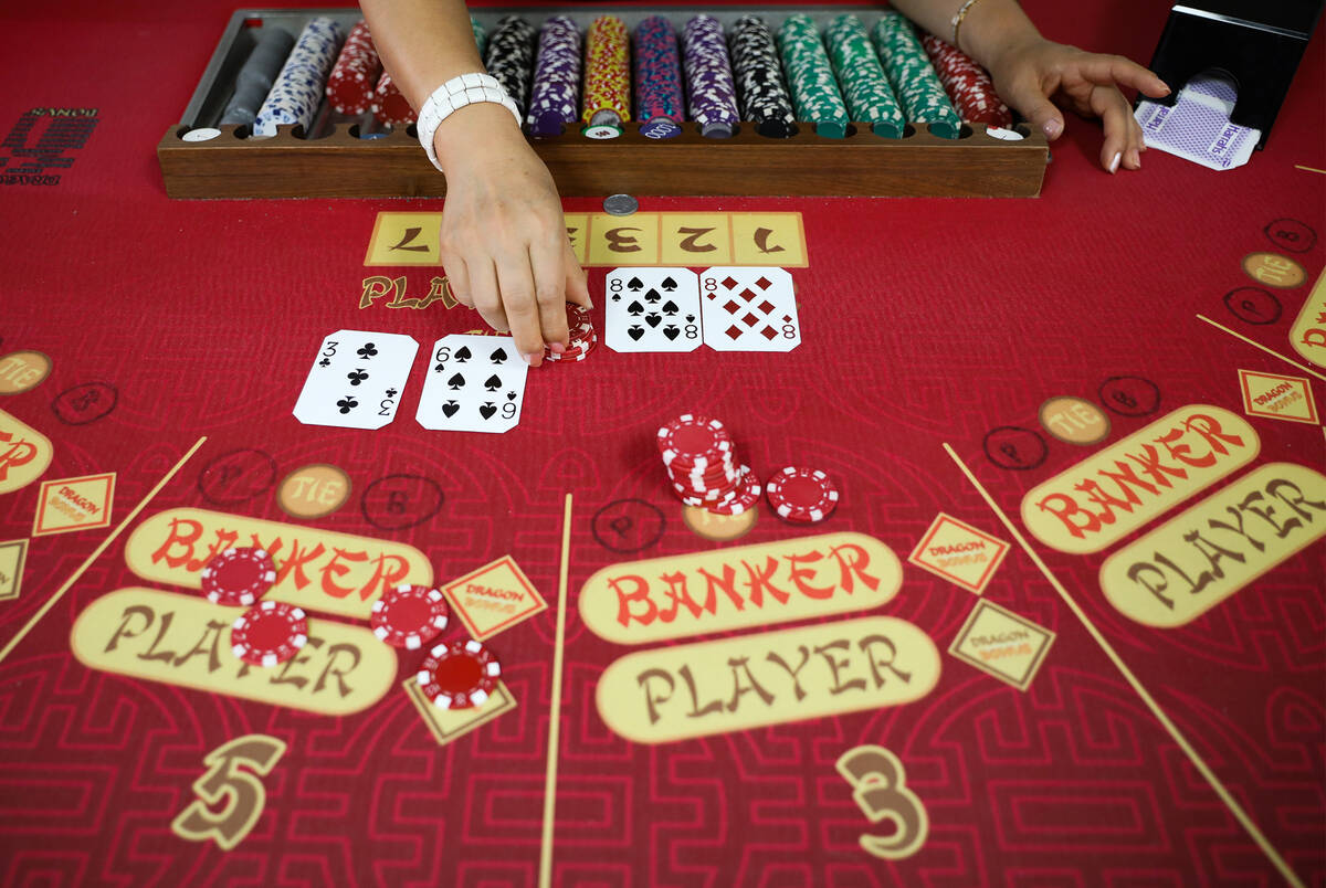 Soon Lee practices dealing baccarat at the CEG Dealer School in Las Vegas, Thursday, April 1, 2 ...