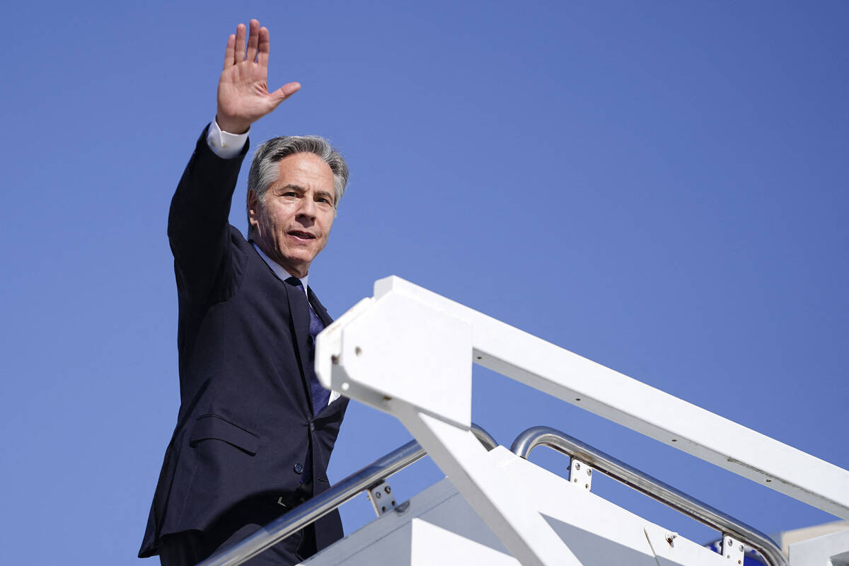 U.S. Secretary of State Antony Blinken boards a plane as he departs Joint Base Andrews, Marylan ...