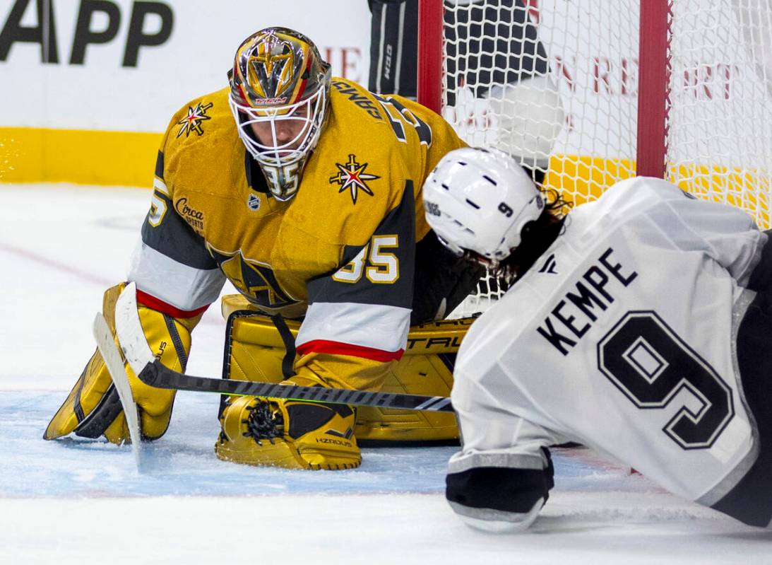 Golden Knights goaltender Ilya Samsonov (35) smothers another shot in close by Los Angeles King ...