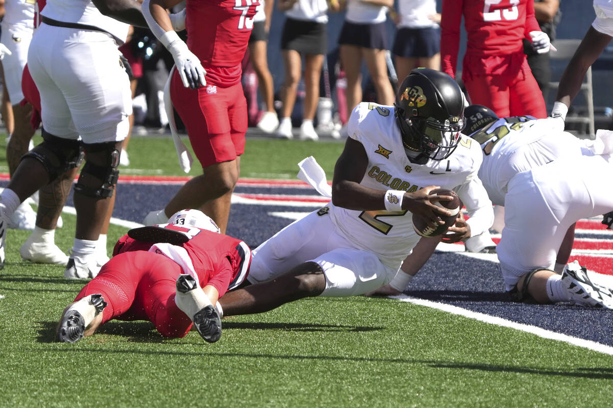 Colorado quarterback Shedeur Sanders (2) in the first half during an NCAA college football game ...