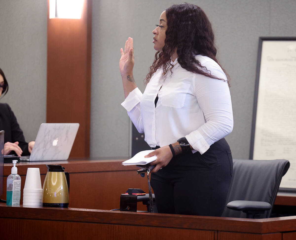 Itaska Dean, girlfriend of Julius Trotter, is sworn in on the witness stand during the murder t ...