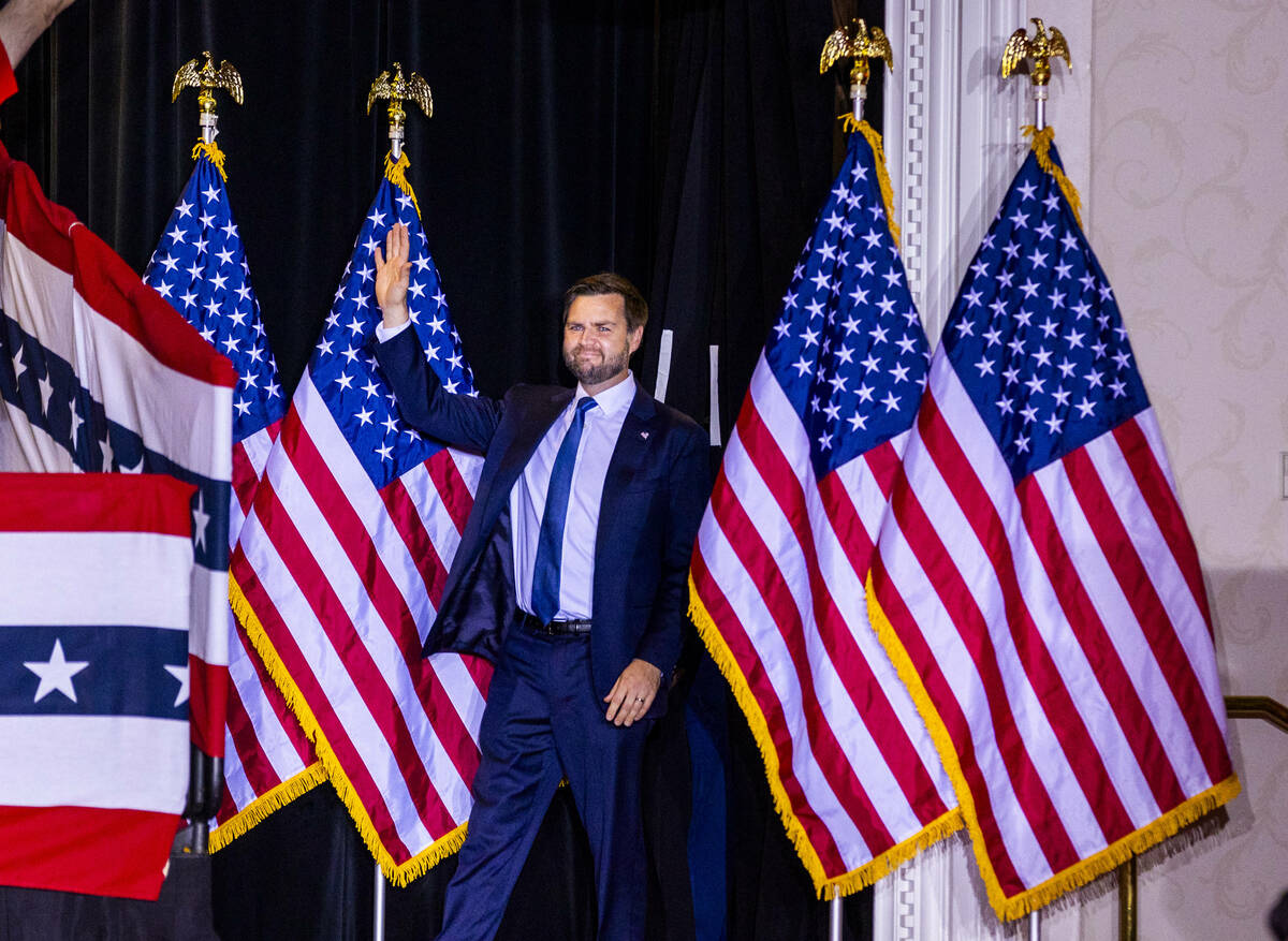 Republican vice presidential nominee Sen. JD Vance arrives on stage to speak to supporters at T ...