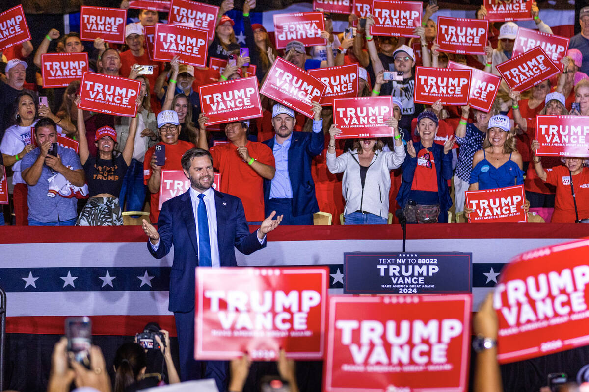 Republican vice presidential nominee Sen. JD Vance arrives on stage to speak to supporters at T ...