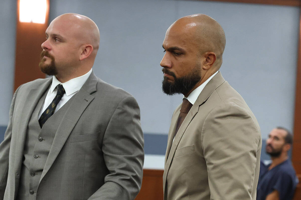 Sgt. Kevin Menon, right, appears in court with his attorney Austin Barnum during a preliminary ...