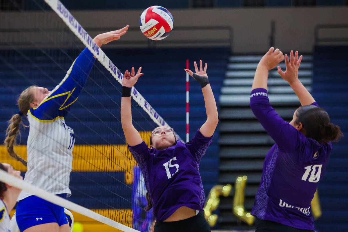 Durango outside hitter Aracelli Hernandez (15) jumps up to hit the ball during a volleyball mat ...