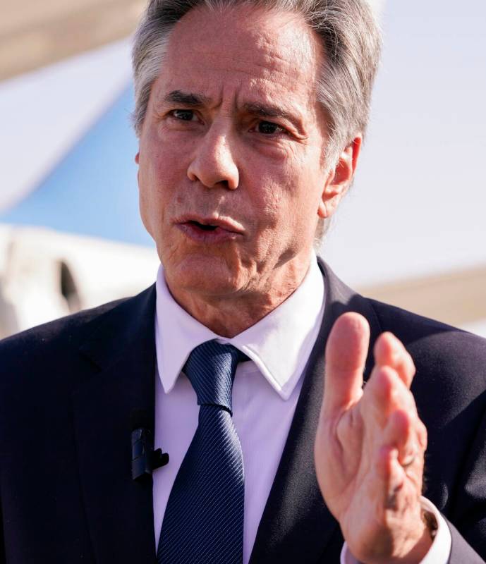 U.S. Secretary of State Antony Blinken speaks with members of the media as he arrives at Ben Gu ...