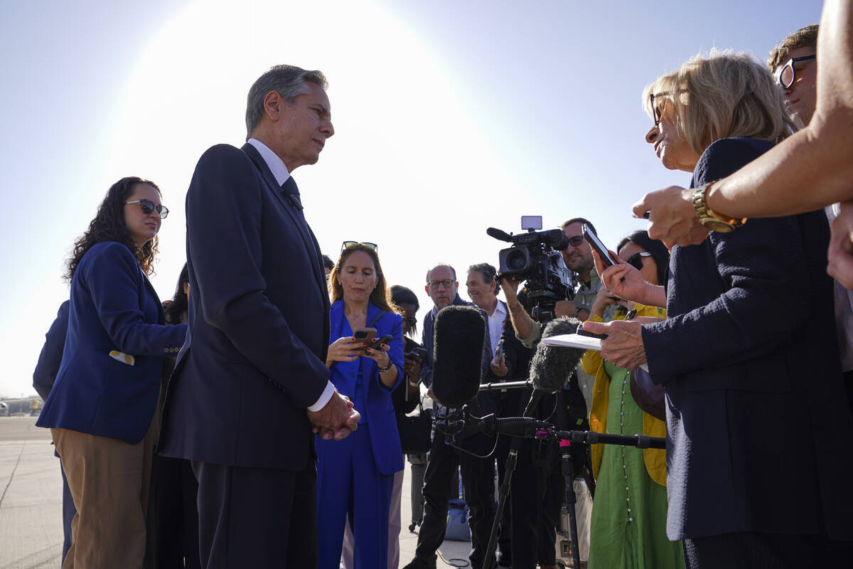 U.S. Secretary of State Antony Blinken speaks with members of the media as he arrives at Ben Gu ...