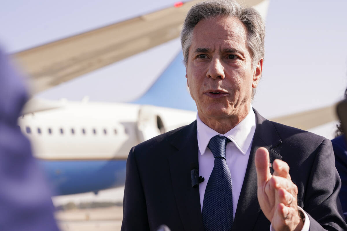 U.S. Secretary of State Antony Blinken speaks with members of the media as he arrives at Ben Gu ...