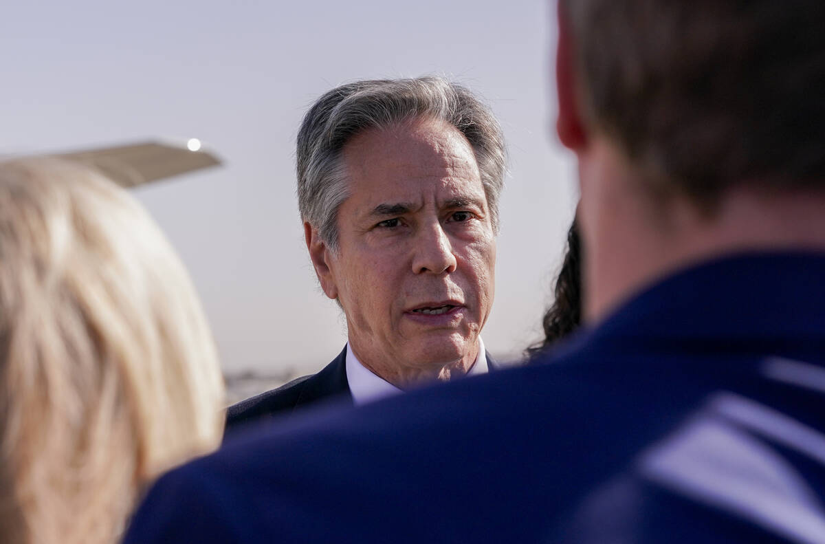 U.S. Secretary of State Antony Blinken speaks with members of the media as he arrives at Ben Gu ...