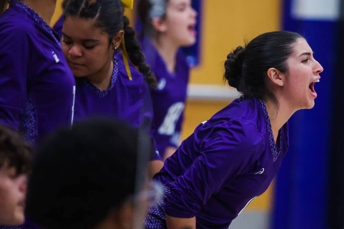 Durango defensive specialist Vivian Rankin cheers for her teammates fro the sidelines during a ...