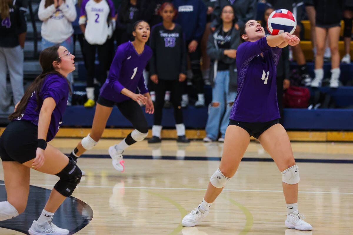 Durango defensive specialist Vivian Rankin (4) hits the ball during a volleyball match between ...