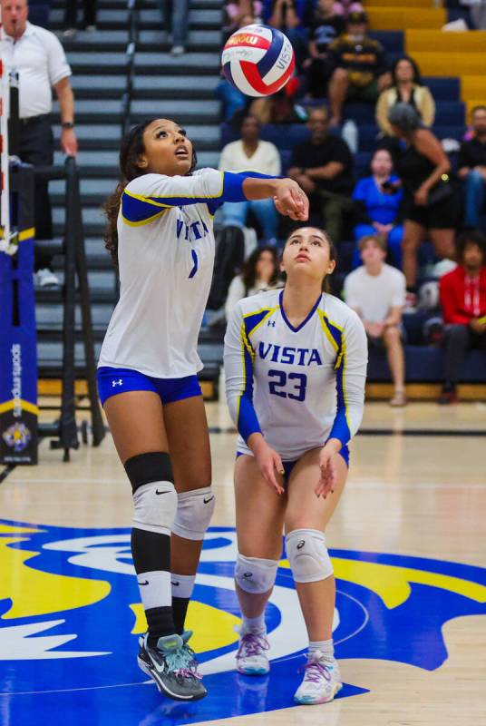 Sierra Vista middle blocker Araeya Pearson (1) bumps the ball during a volleyball match between ...