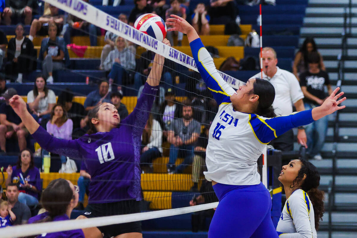 Sierra vista outside hitter Ariella Maika (16) hits the ball back over the net as Durango middl ...