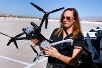 Mary Movius, a civilian drone operator, displays a Skydio X10 during a drone demonstration for ...