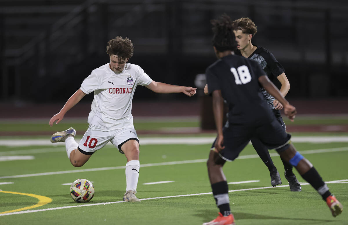 Coronado midfielder Aiden Sena (10) kicks the ball during a soccer game at Palo Verde High Scho ...