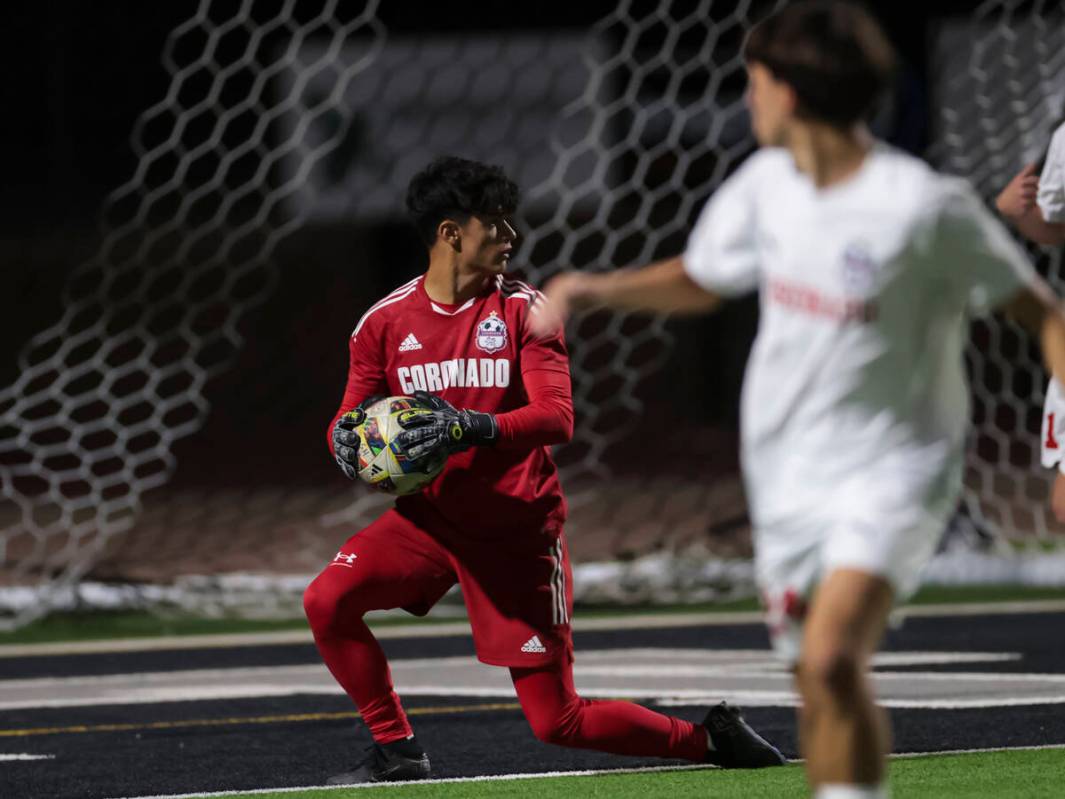 Coronado's goalkeeper Logan Pierce looks on after making a stop during a soccer game at Palo Ve ...