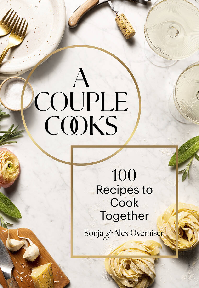 This cover image released by Chronicle Books shows "A Couple Cooks: 100 Recipes to Cook To ...