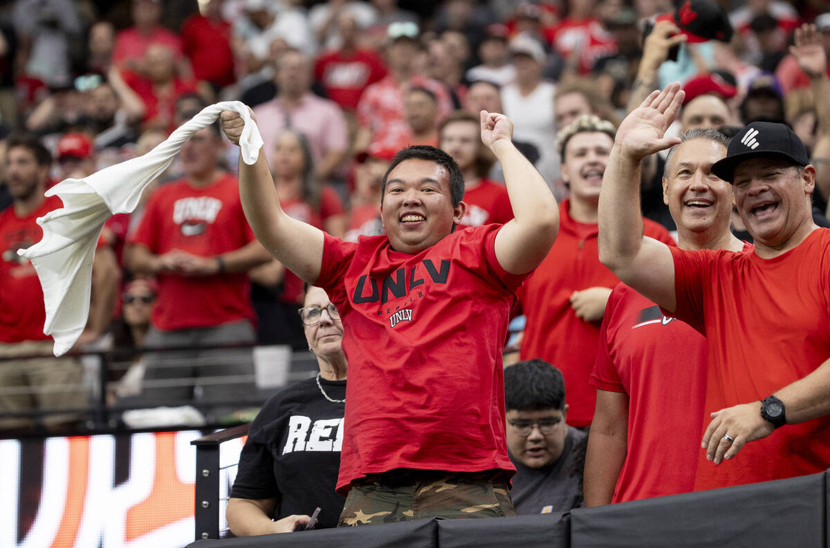 UNLV fans cheer during the college football game against Fresno State at Allegiant Stadium, Sat ...