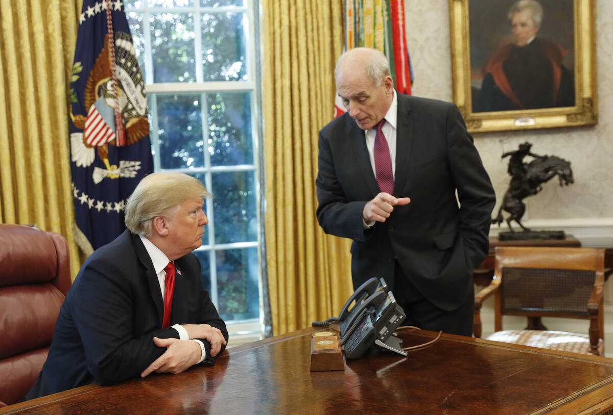 FILE - President Donald Trump listens to White House Chief of Staff John Kelly, right, in the O ...