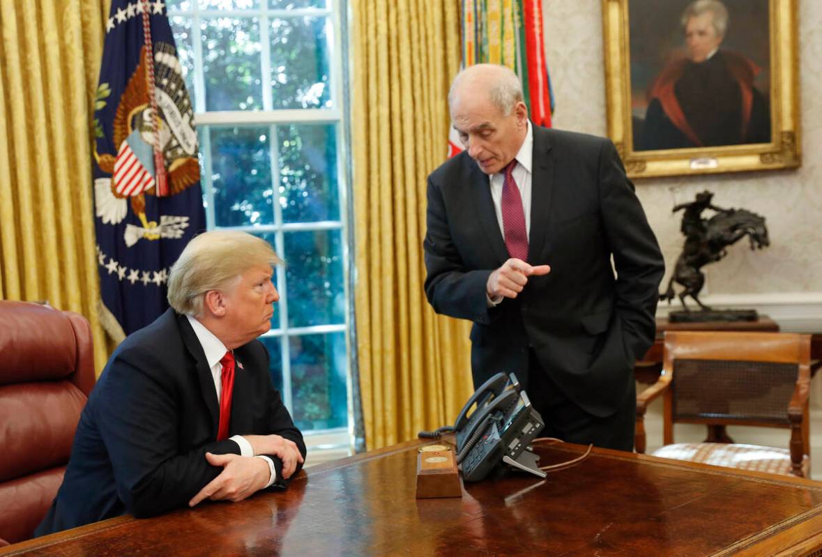 FILE - President Donald Trump listens to White House Chief of Staff John Kelly, right, in the O ...