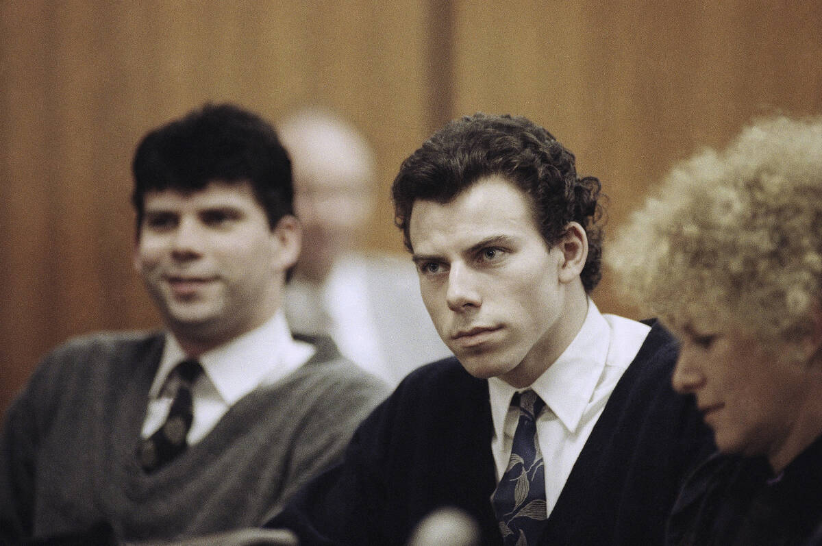 Lyle, left, and Erik Menendez sit with defense attorney Leslie Abramson, right, in Beverly Hill ...