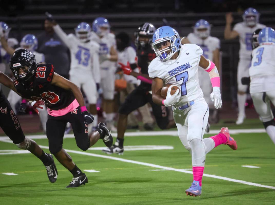 Centennial wide receiver Dale Flores Jr. (7) runs the ball during a football game at Las Vegas ...