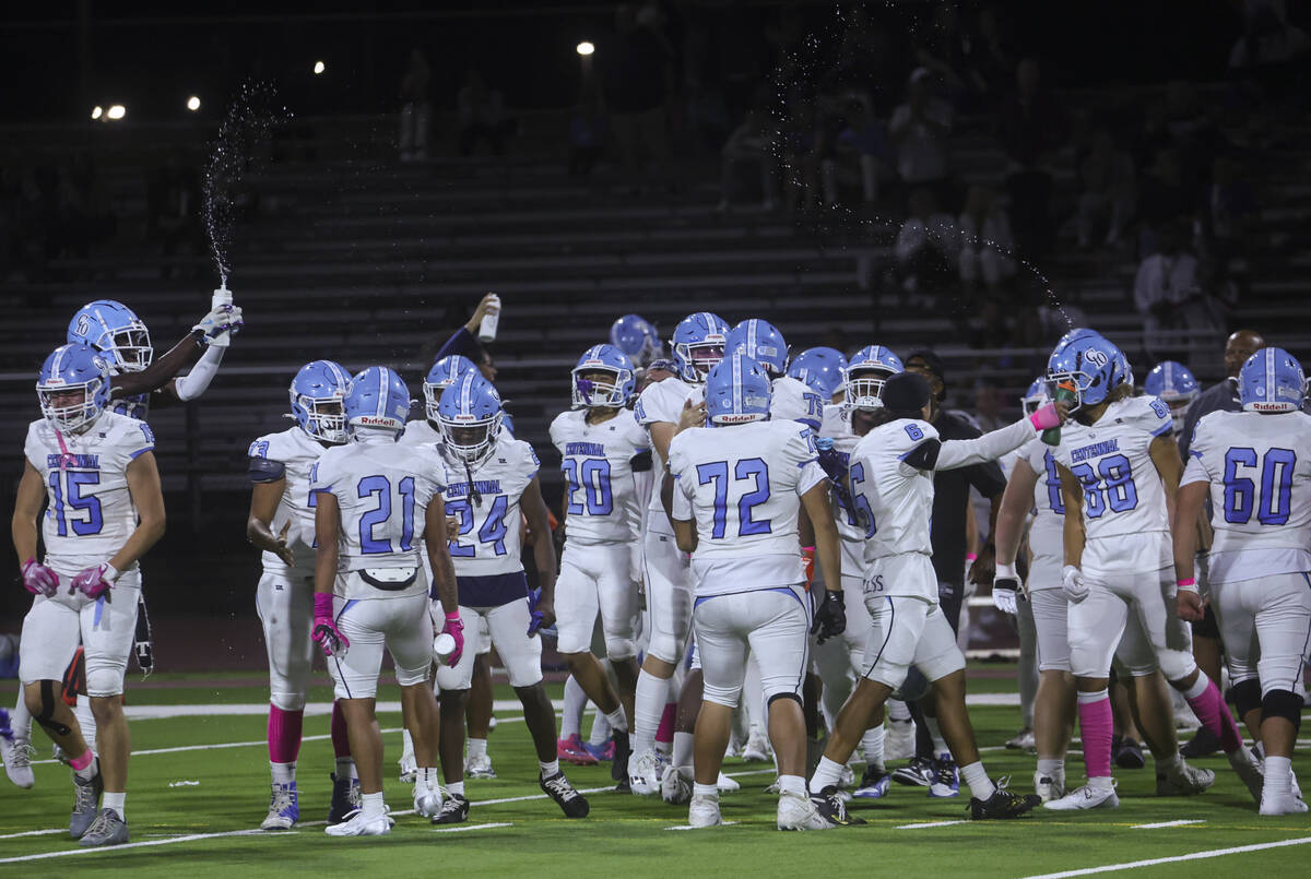 Centennial players celebrate after defeating Las Vegas in a football game at Las Vegas High Sch ...