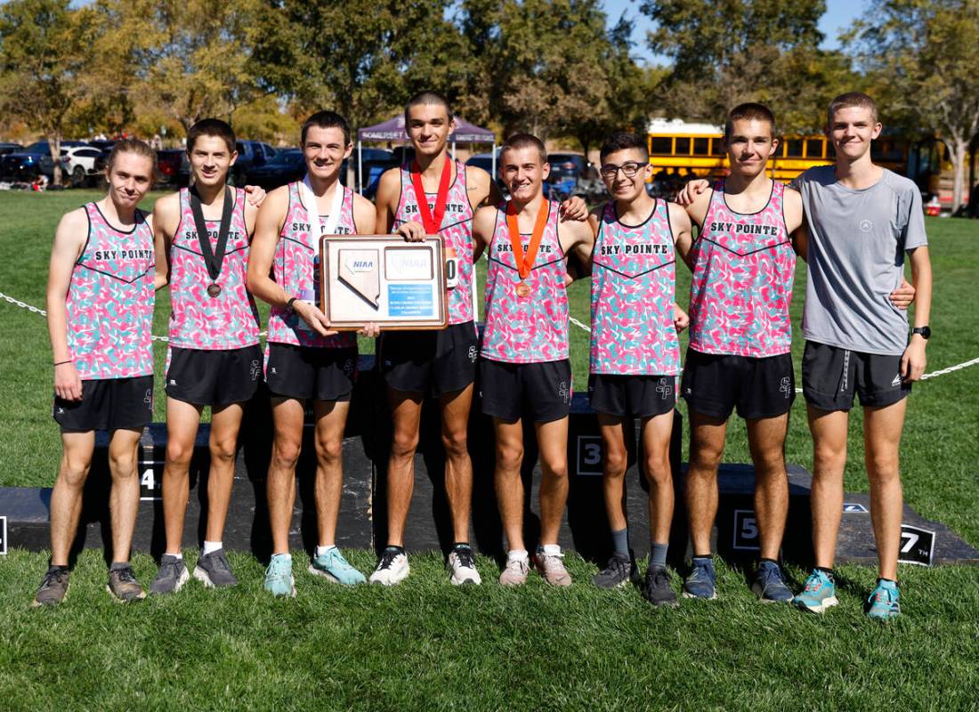 Somerset Academy Sky Pointe runners pose for a photo after winning the 4A Desert boys cross cou ...