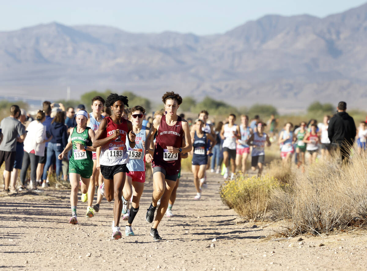 Kenan Dagge of Desert Oasis, left, and Brady Anderson of Faith Lutheran lead the pack during th ...