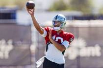 Raiders quarterback Desmond Ridder (10) throws the football during team practice at the Intermo ...