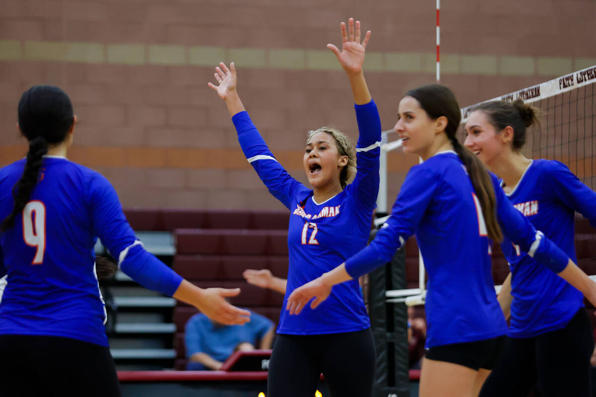 Bishop Gorman outside hitter Brooklynn Williams (12) celebrates with her team during a volleyba ...