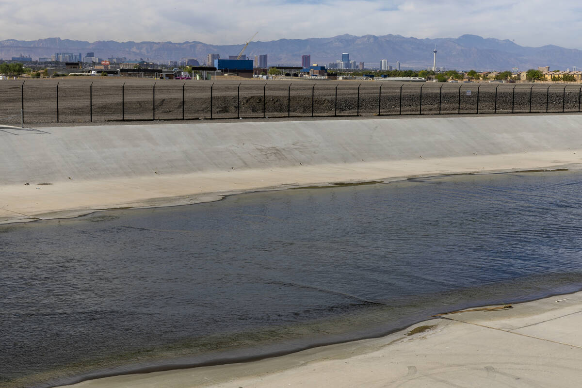 Treated water flows down a channel and into the Las Vegas wash adjacent to the Clark County Wat ...