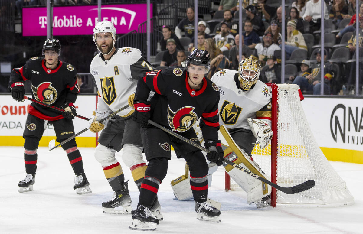 Golden Knights and Ottawa Senators players compete during the second period of the NHL hockey g ...