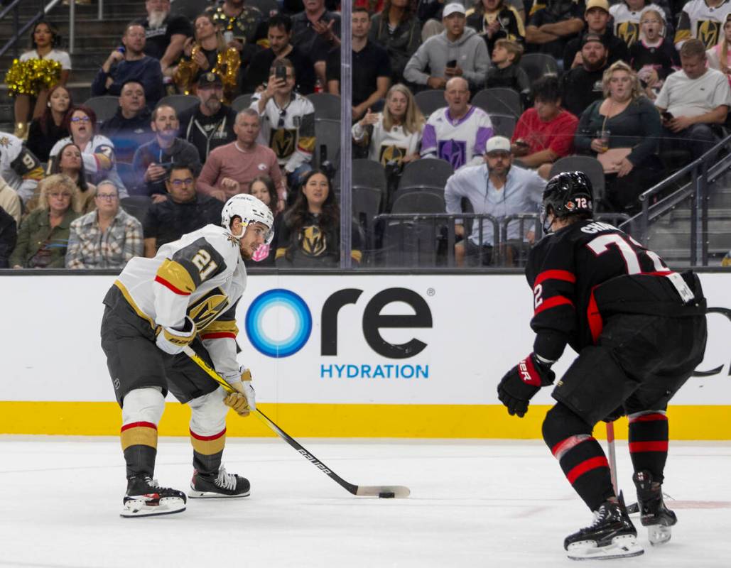 Golden Knights center Brett Howden (21) looks to shoot the puck during the NHL hockey game agai ...