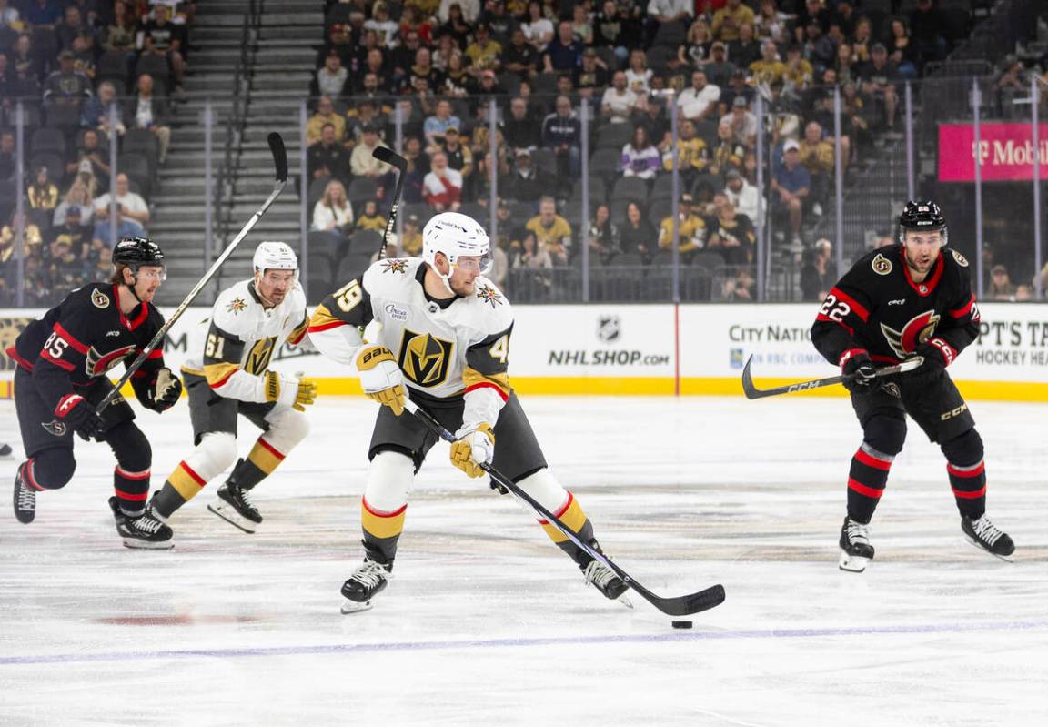 Golden Knights center Ivan Barbashev (49) skates with the puck during the first period of the N ...