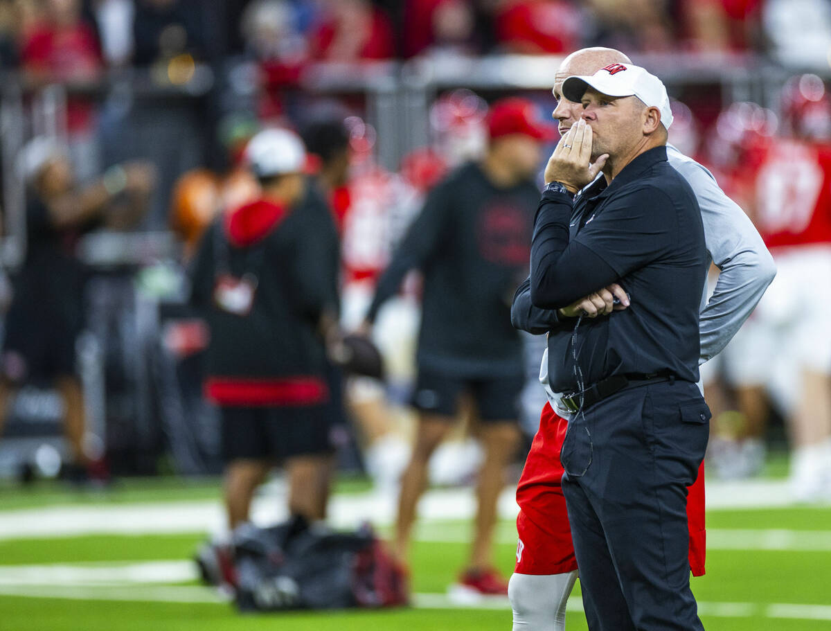 UNLV head coach Barry Odom ponders as he watches his players during warm ups of their NCAA foot ...