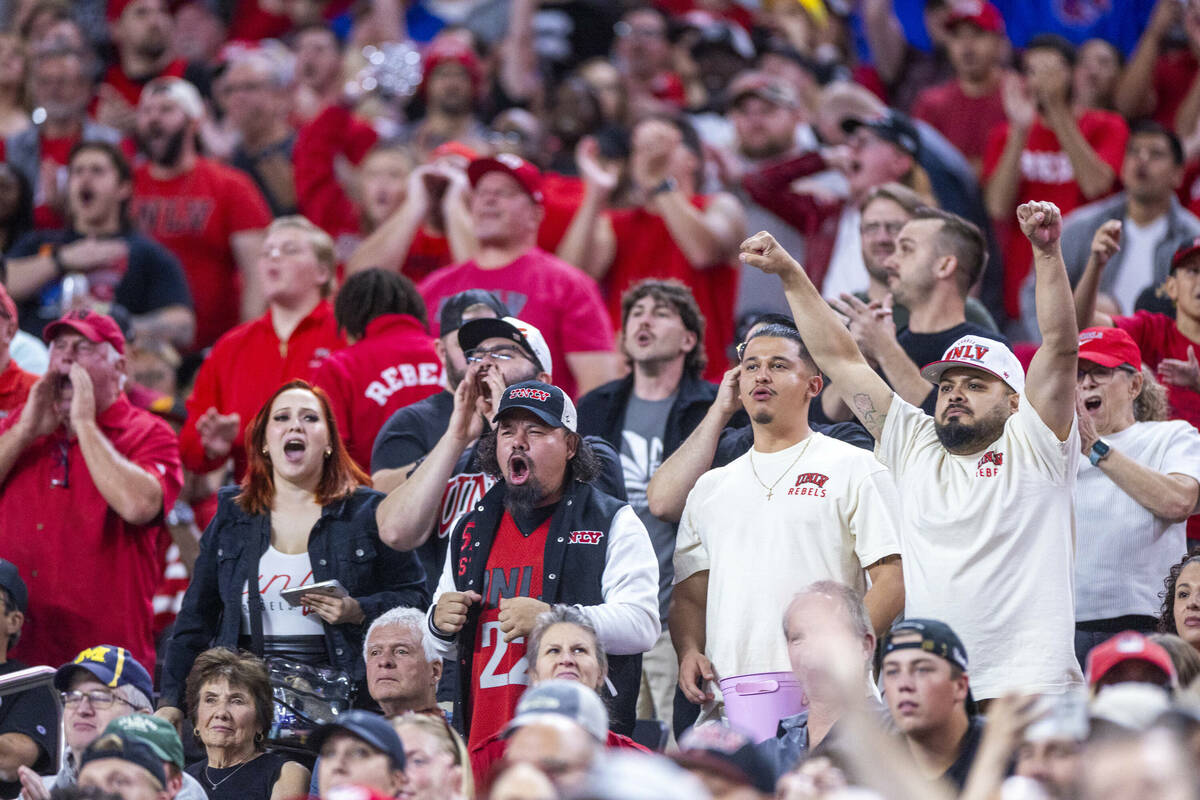 UNLV fans cheer their team on against the Boise State Broncos during the first half of their NC ...