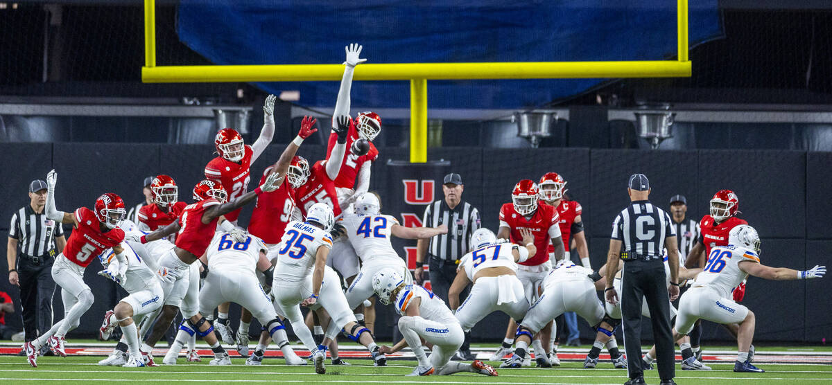 UNLV defensive end Antonio Doyle Jr. (2) nearly gets the block on a Boise State Broncos place k ...