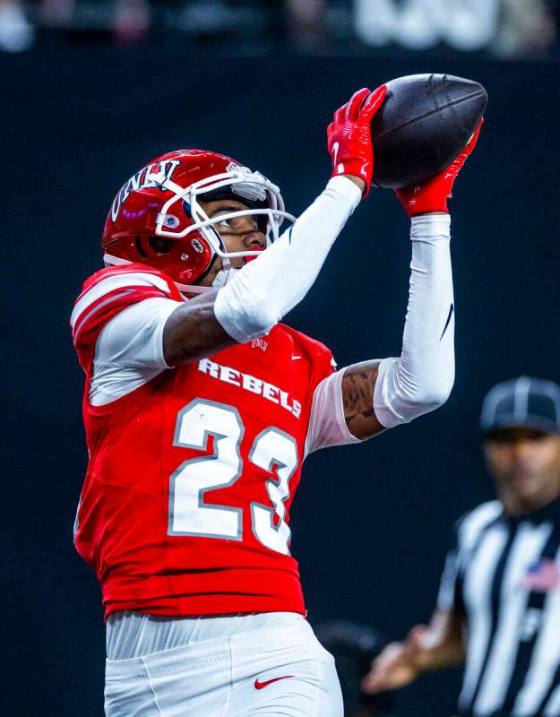 UNLV wide receiver Jaden Bradley (23) hauls in a touchdown pass against the Boise State Broncos ...